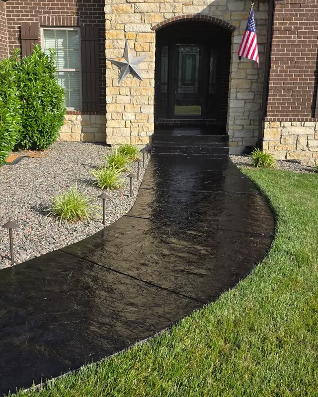 Stamped concrete front walk after sealing