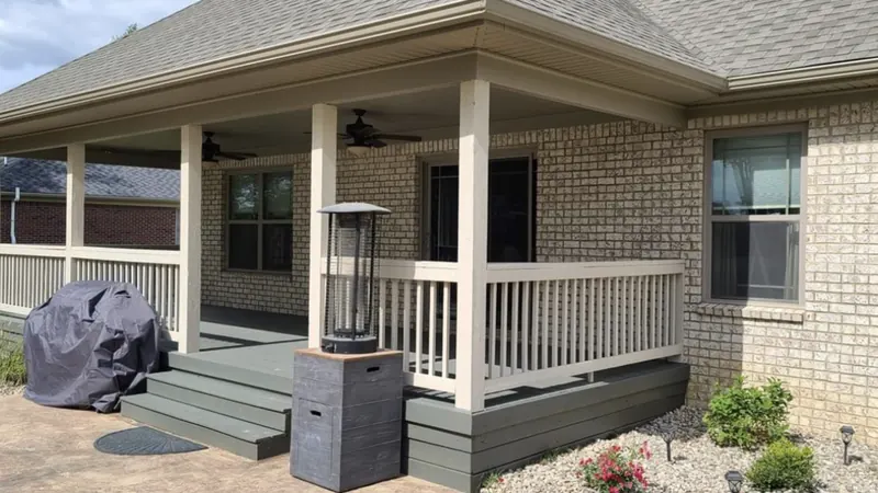 After: covered wood porch deck, cleaned by Meyer Pressure Washing