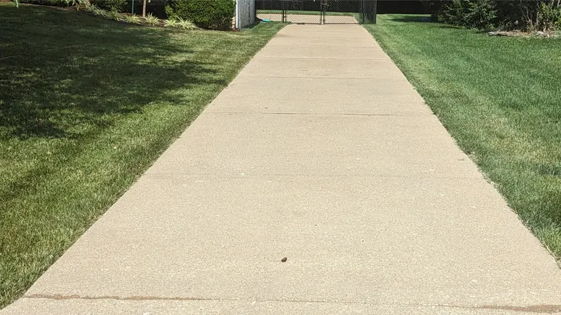 After: concrete driveway, cleaned by Meyer Pressure Washing