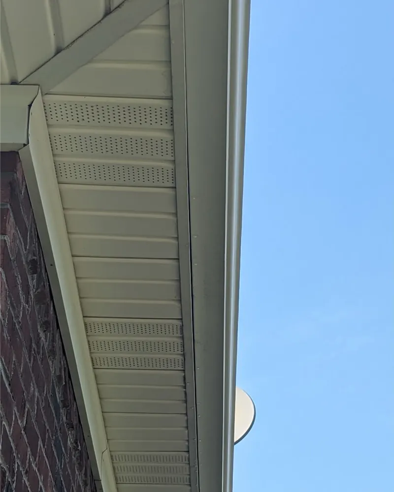 After: gutter and soffit on a brick home, cleaned by Meyer Pressure Washing