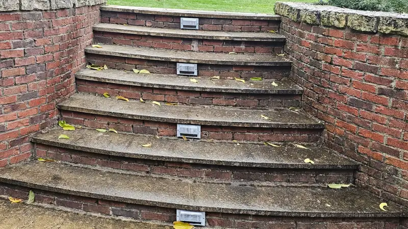 Before: curved brick steps with limestone caps