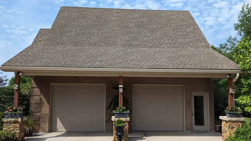 After: asphalt shingle garage roof with black algae streaks, cleaned by Meyer Pressure Washing