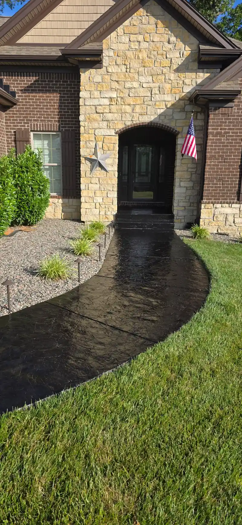 Stamped concrete front walk after sealing
